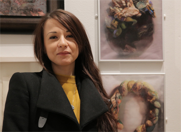 Thumbnail image of Stefania Laccu in front of 'Psychosomatic Skin Disorders' (triptych) - LSA Annual Exhibition 2017 Prize Winners